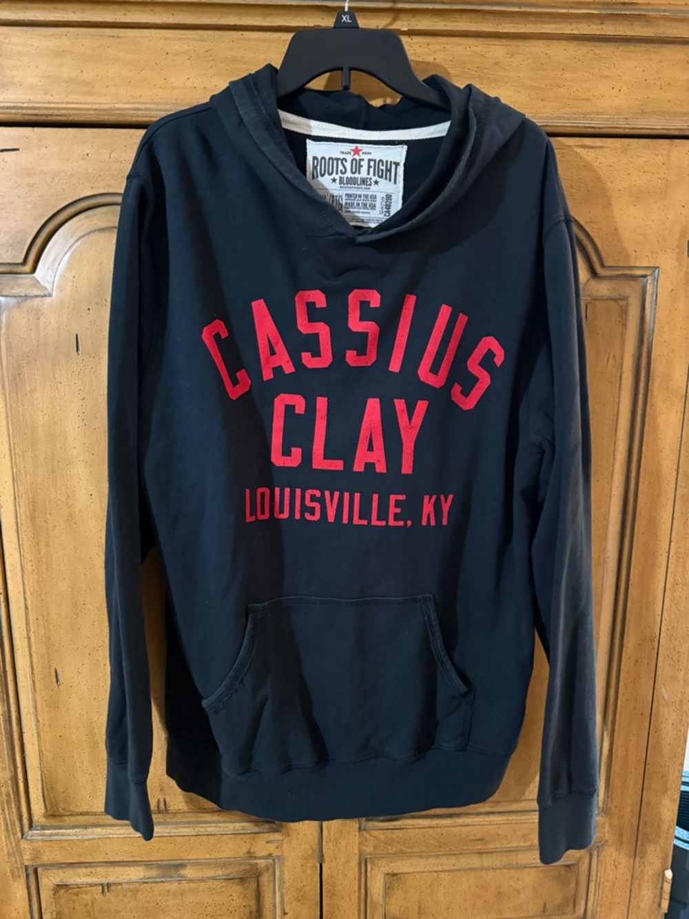 Roots of Fight Cassius Clay Black Hoodie with Red Lettering